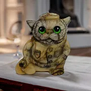 На память: Скульптура «Кот с мешком» из камня — фотография 1